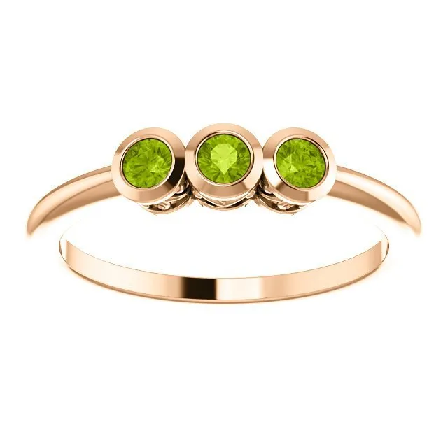 14KT GOLD 0.27 CTW ROUND PERIDOT BEZEL-SET 3 STONE RING