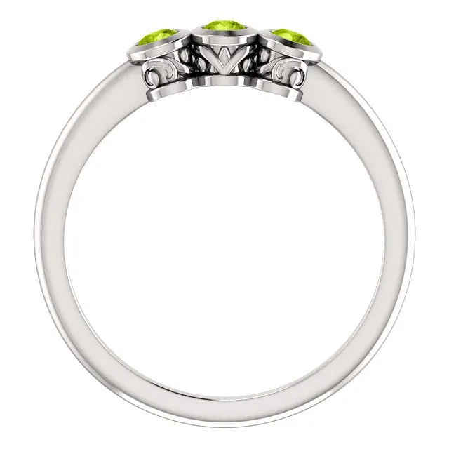 14KT GOLD 0.27 CTW ROUND PERIDOT BEZEL-SET 3 STONE RING