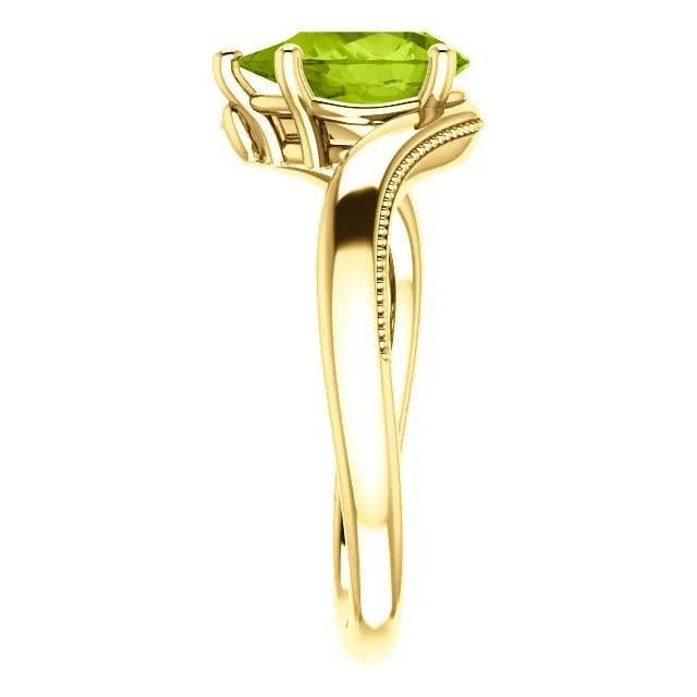 14KT GOLD 1.50 CTW PEAR SHAPE PERIDOT RING