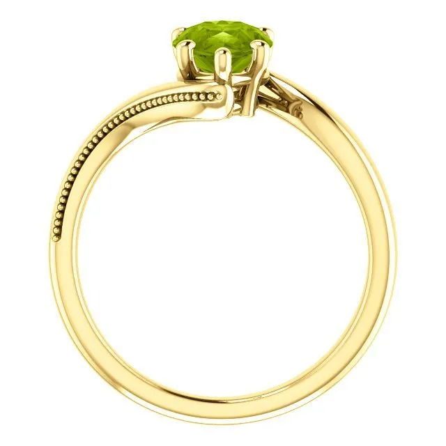 14KT GOLD 1.50 CTW PEAR SHAPE PERIDOT RING