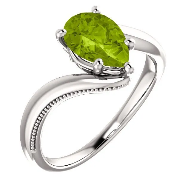 14KT GOLD 1.50 CTW PEAR SHAPE PERIDOT RING