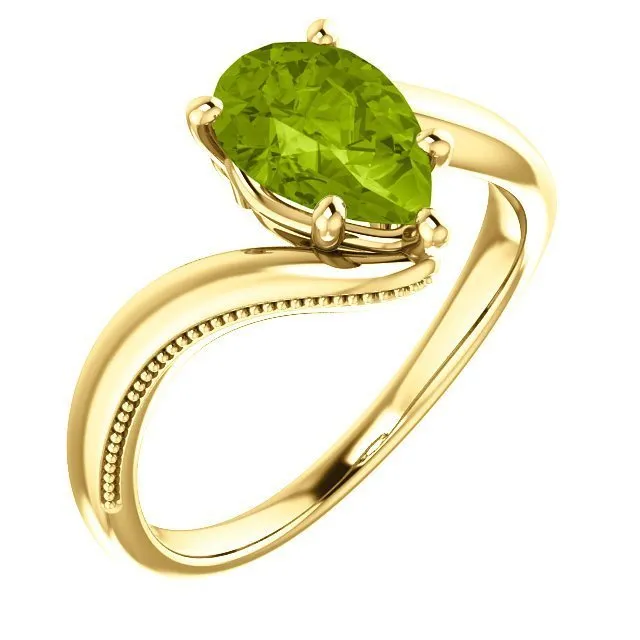 14KT GOLD 1.50 CTW PEAR SHAPE PERIDOT RING