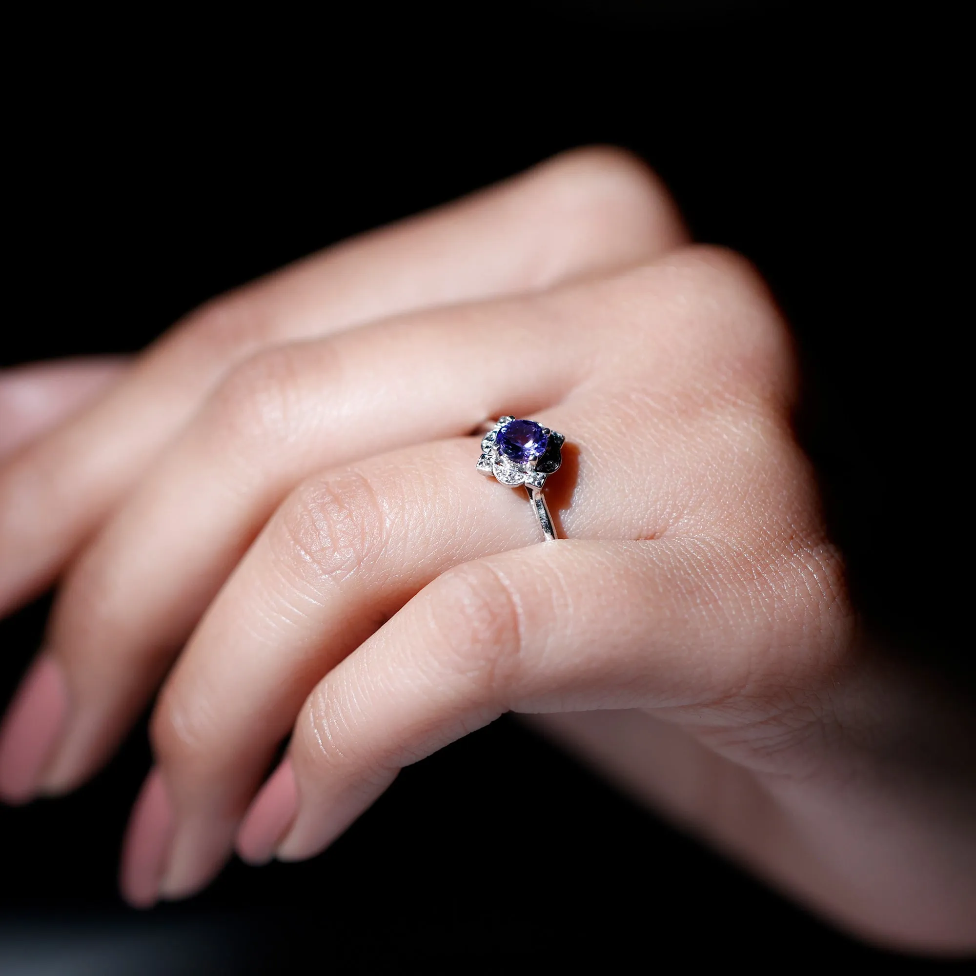 Designer Tanzanite and Diamond Halo Engagement Ring