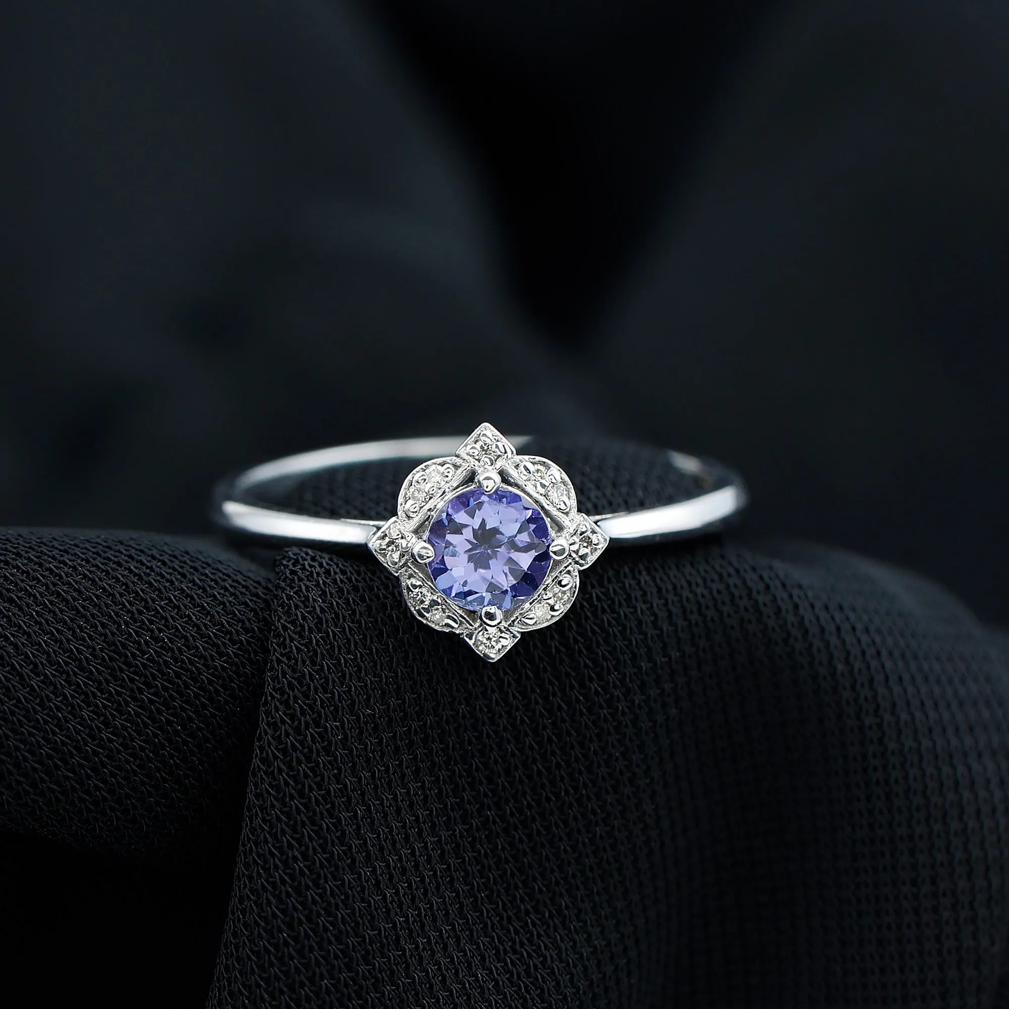 Designer Tanzanite and Diamond Halo Engagement Ring