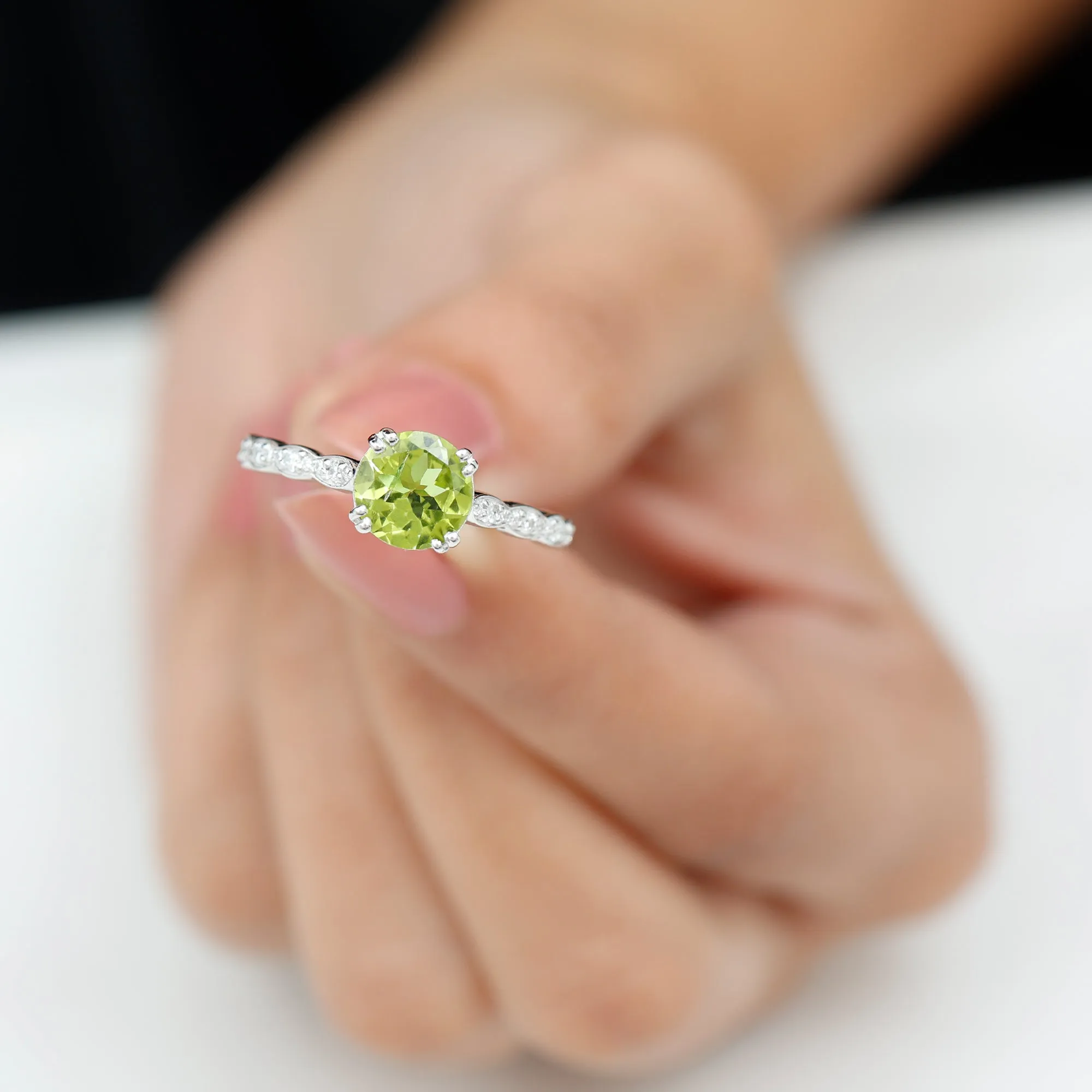 Double Prong Set Peridot Solitaire Ring with Diamond Side Stones