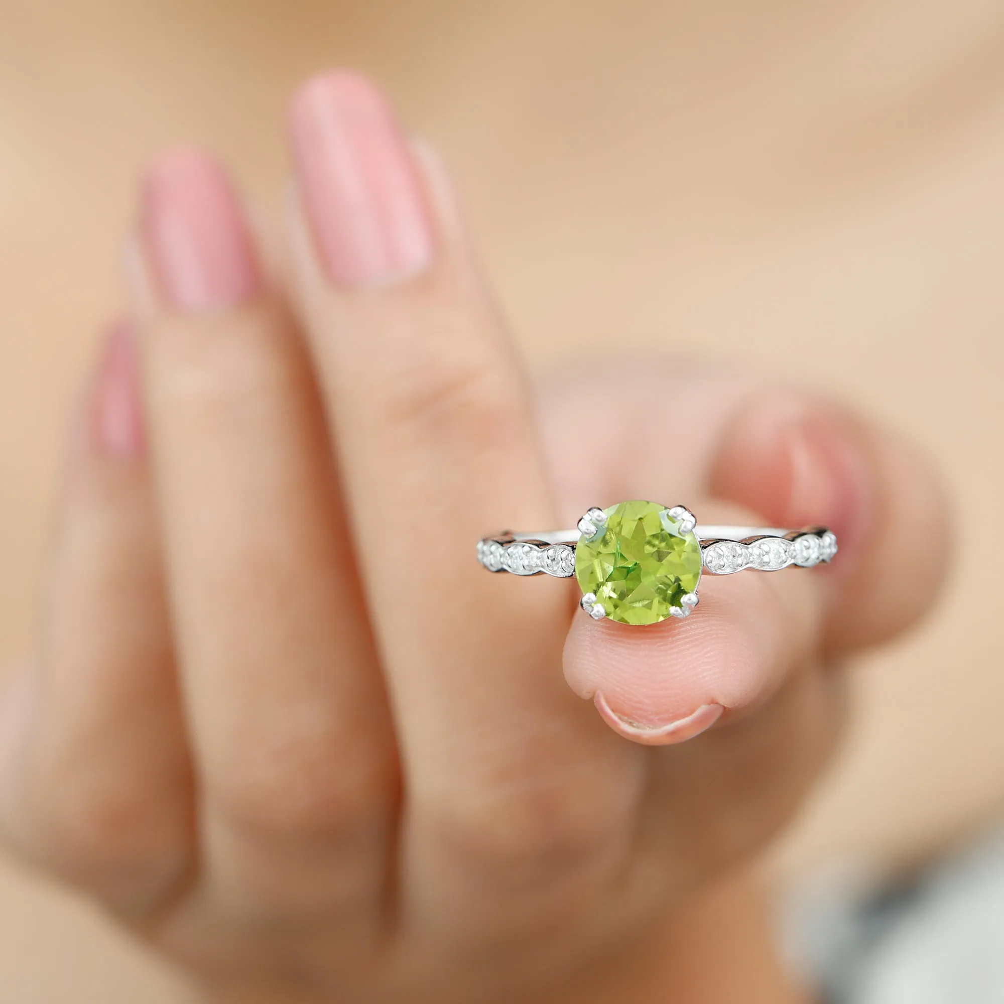 Double Prong Set Peridot Solitaire Ring with Diamond Side Stones