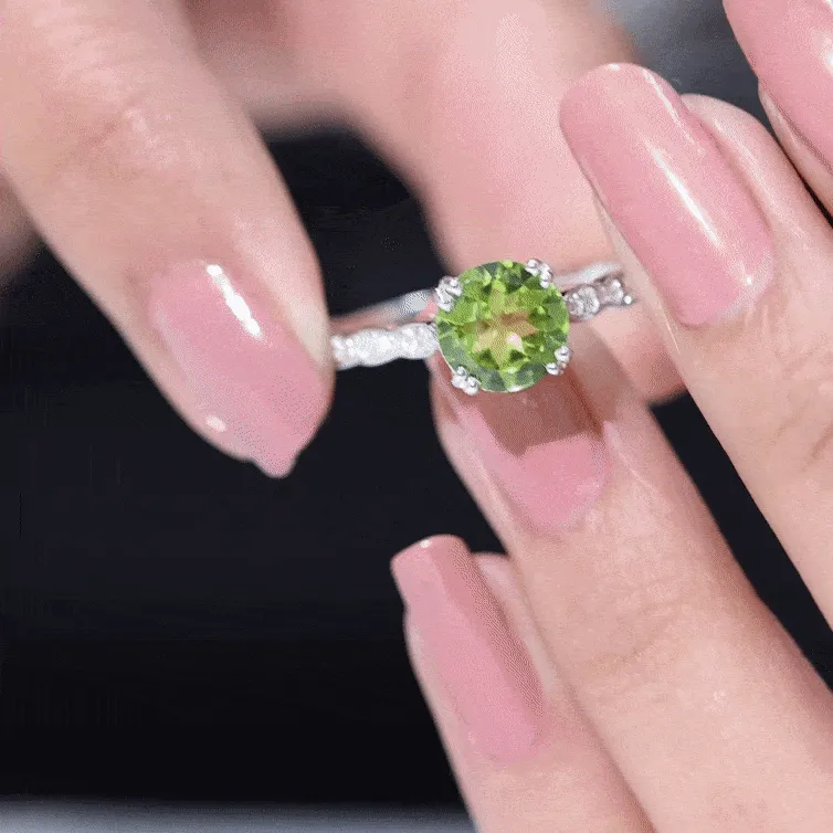 Double Prong Set Peridot Solitaire Ring with Diamond Side Stones