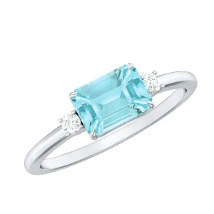 Emerald Cut Sky Blue Topaz East West Engagement Ring with Diamond