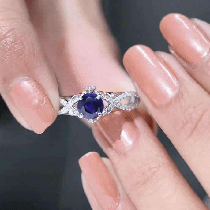 Lab Grown Blue Sapphire Crossover Engagement Ring with Diamond