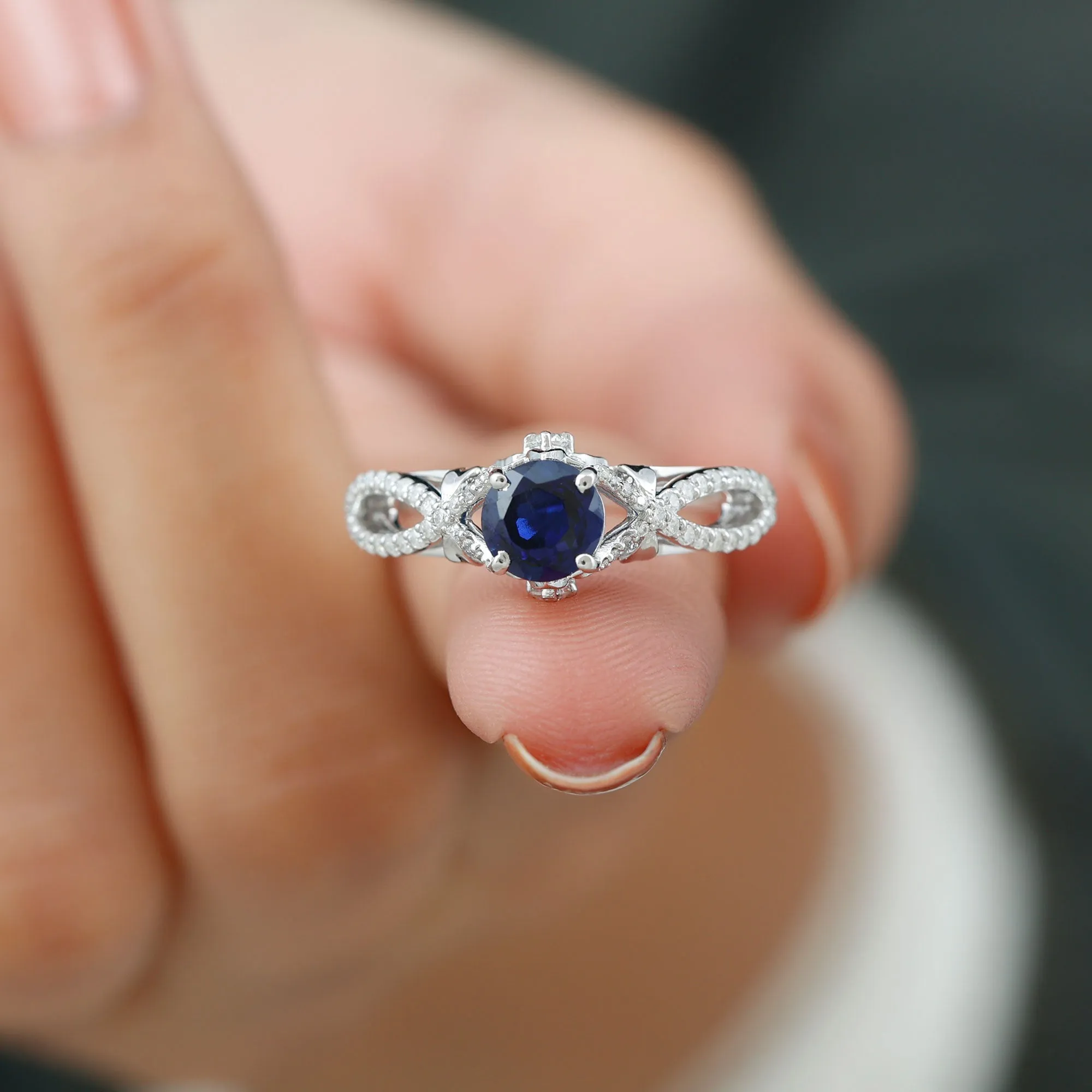 Lab Grown Blue Sapphire Crossover Engagement Ring with Diamond