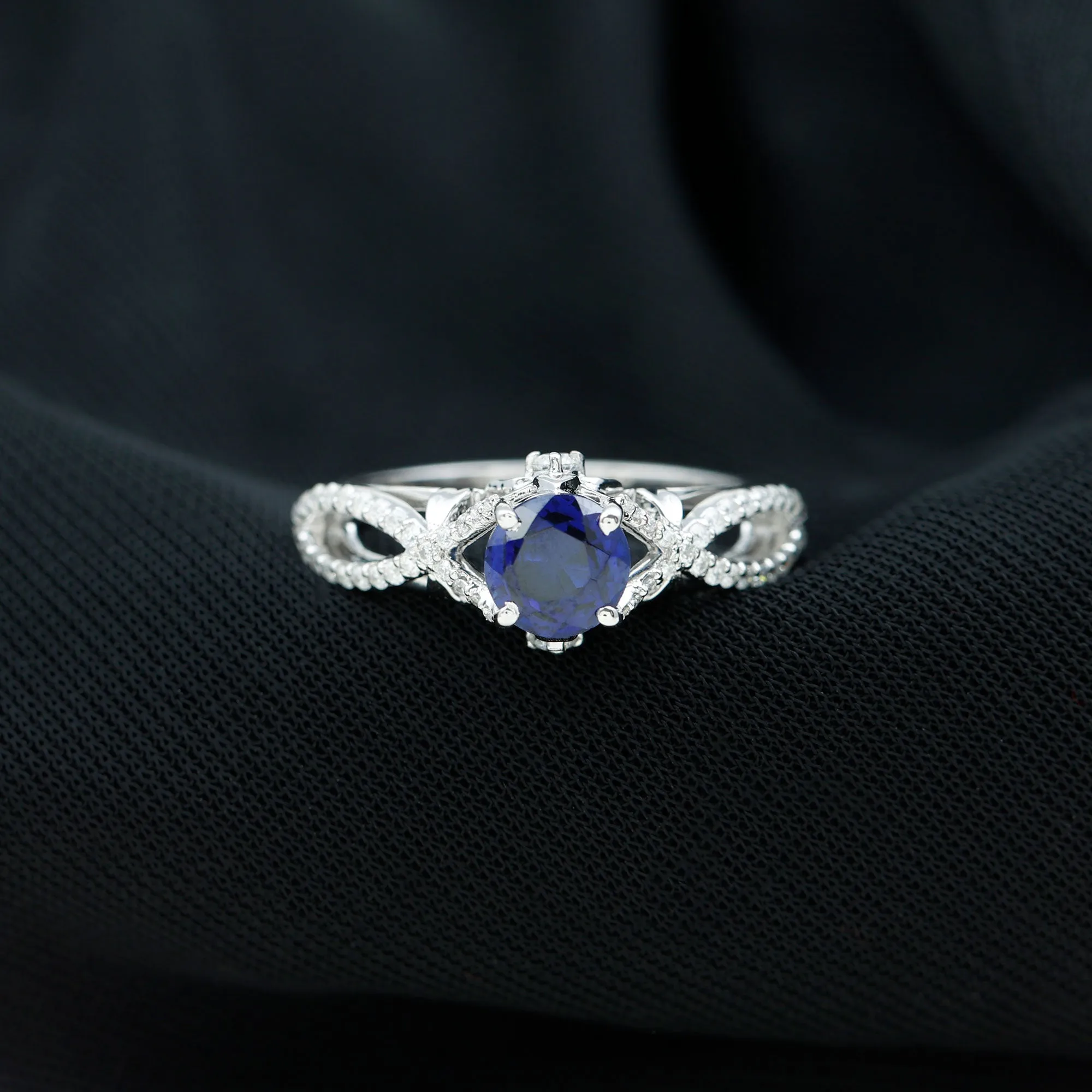 Lab Grown Blue Sapphire Crossover Engagement Ring with Diamond