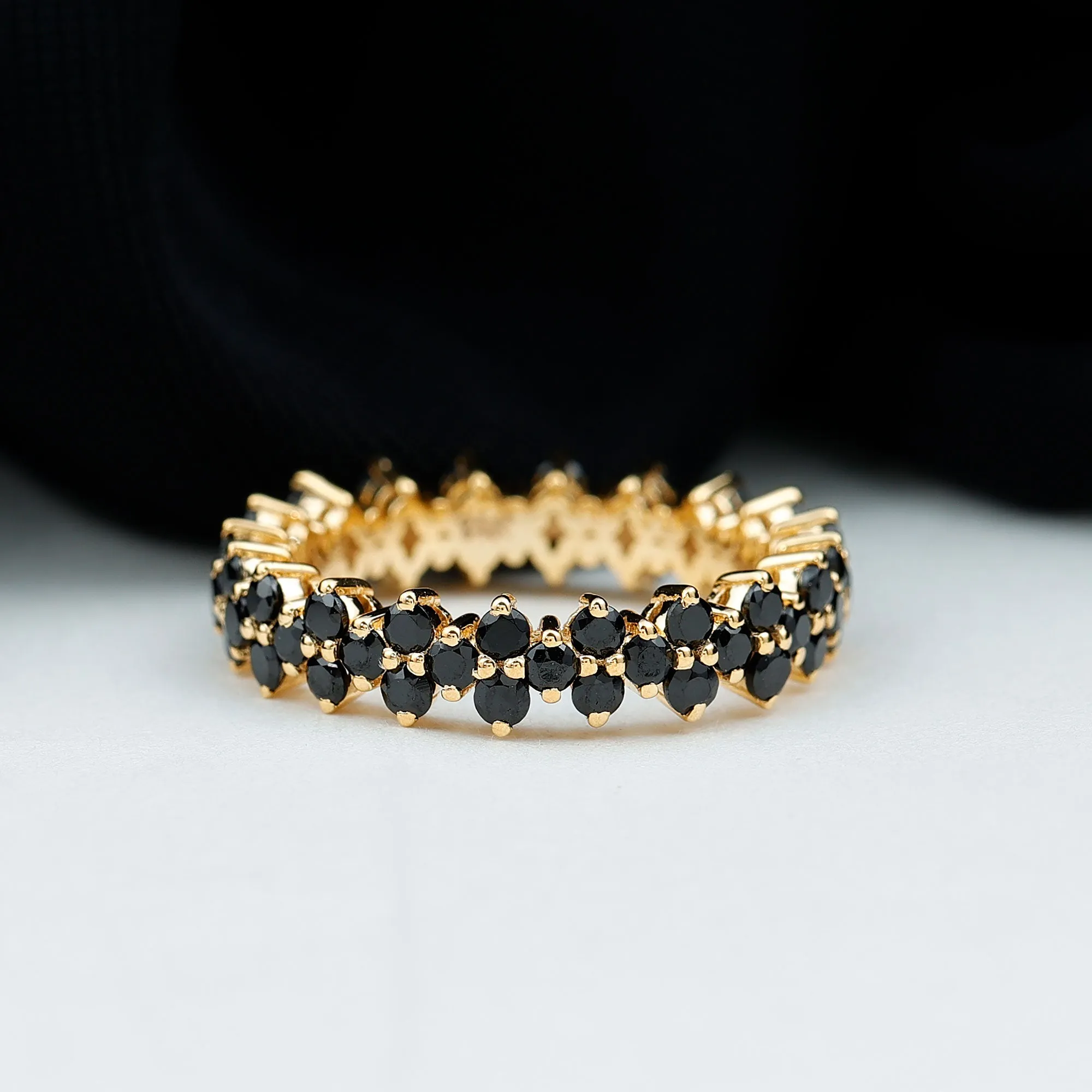 Round Black Spinel Cluster Eternity Ring in Prong Setting