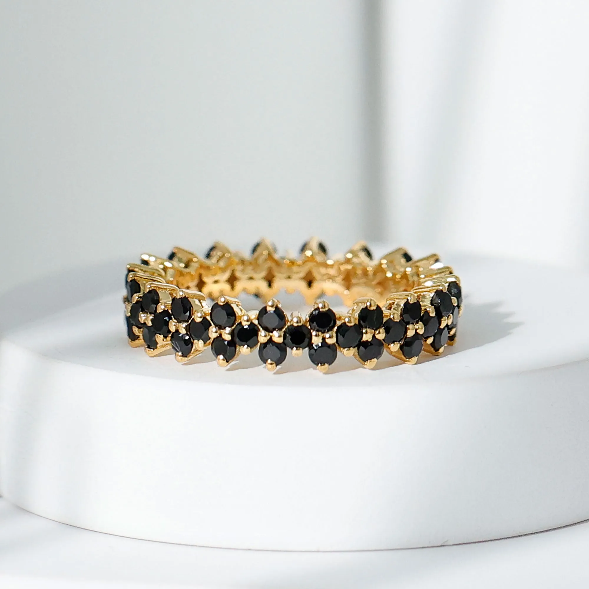 Round Black Spinel Cluster Eternity Ring in Prong Setting