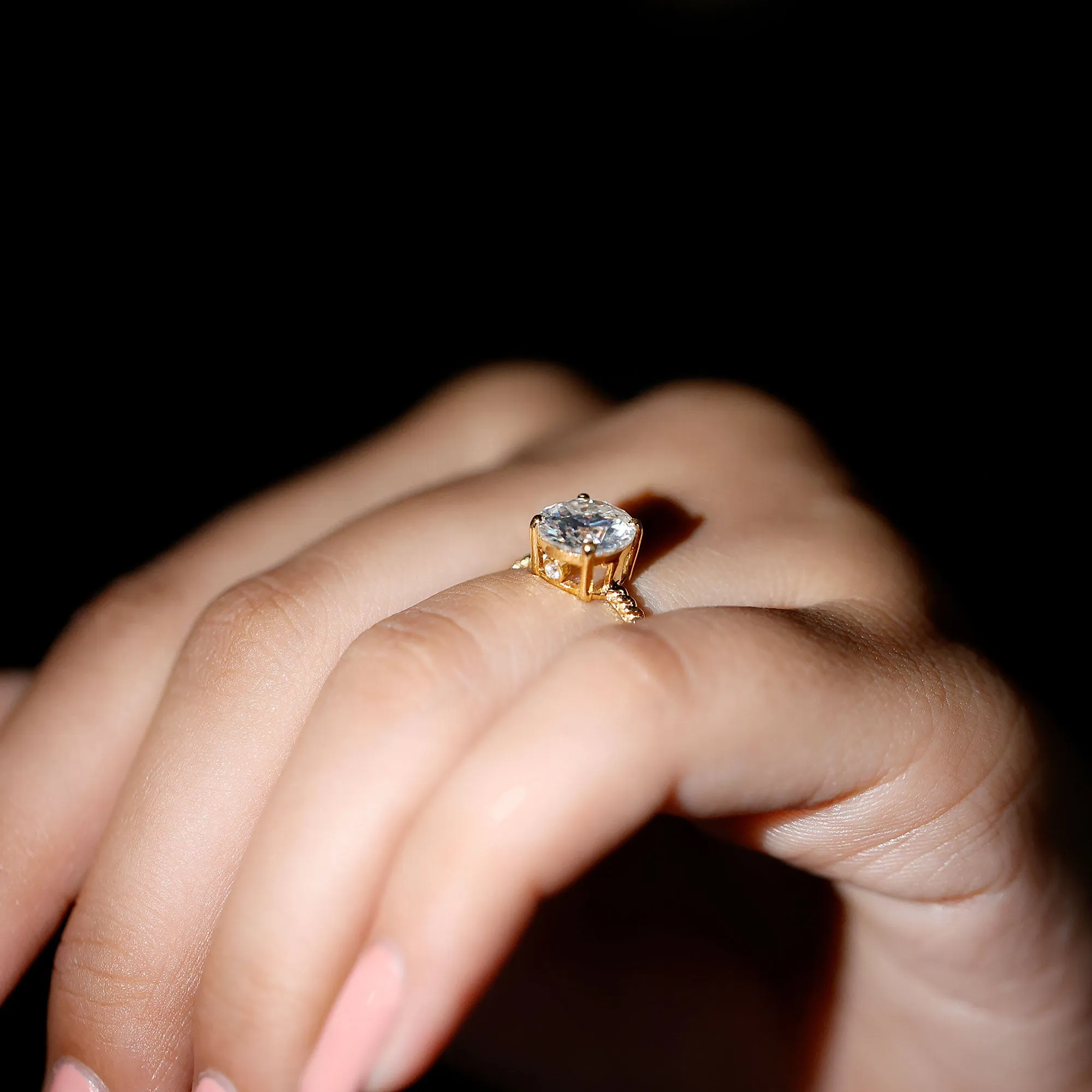 Round Cut Moissanite Solitaire Ring with Gold Twisted Rope