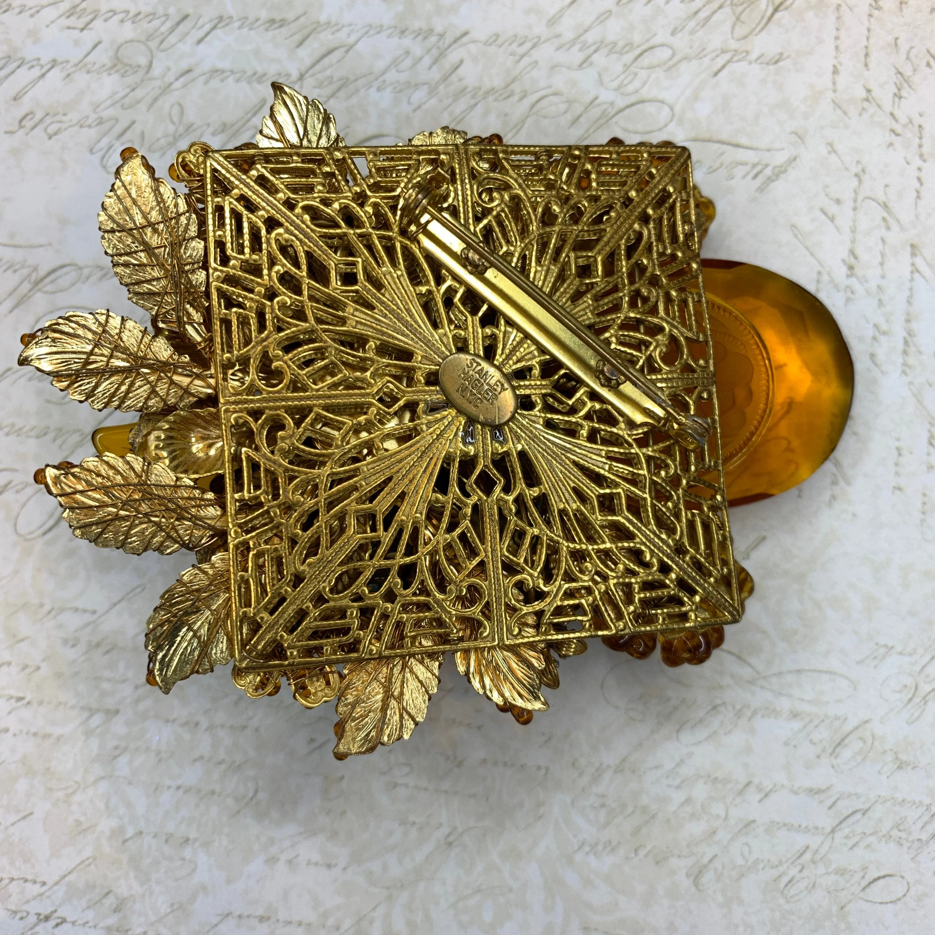 Stanley Hagler Amber Brown glass statement brooch