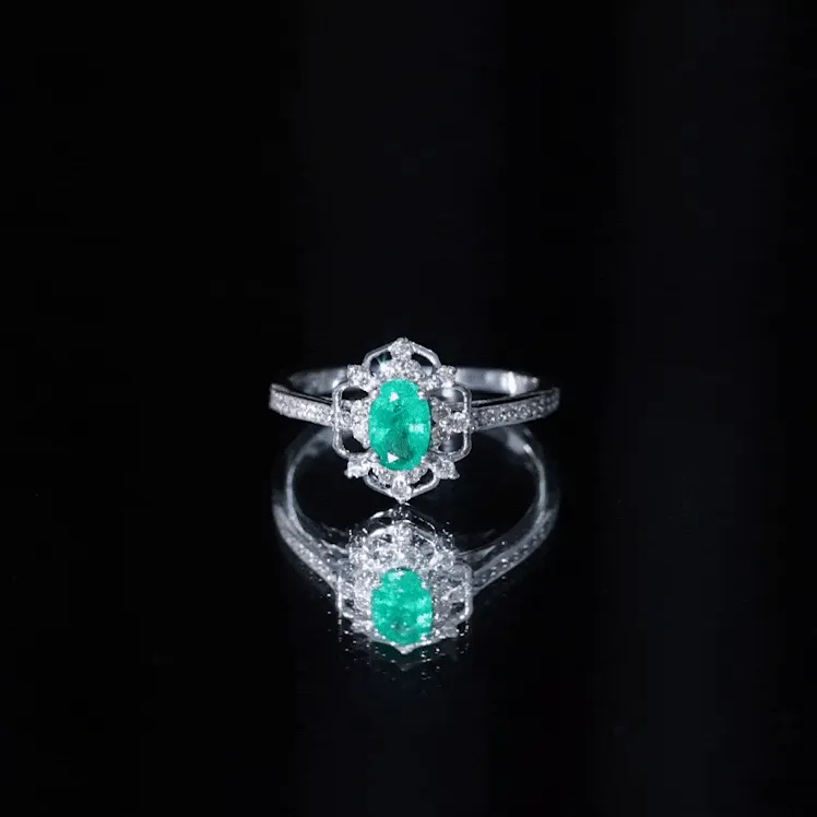 Vintage Style Emerald and Diamond Flower Engagement Ring