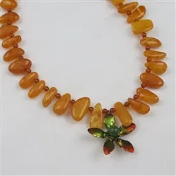 Whimsical Amber Necklace with Medtal Flower Pendant